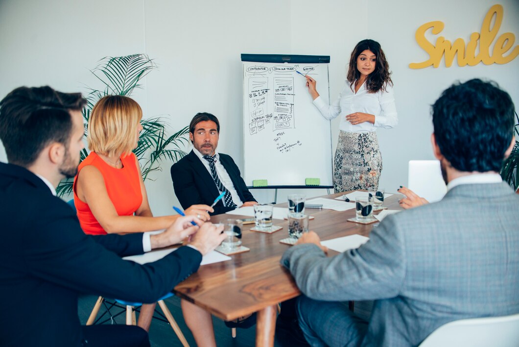 businesswoman-showing-her-strategy_23-2147577244